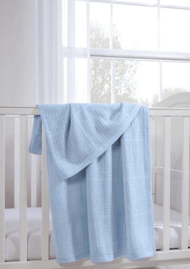 Blue baby blanket hanging over a cot for child blankets category